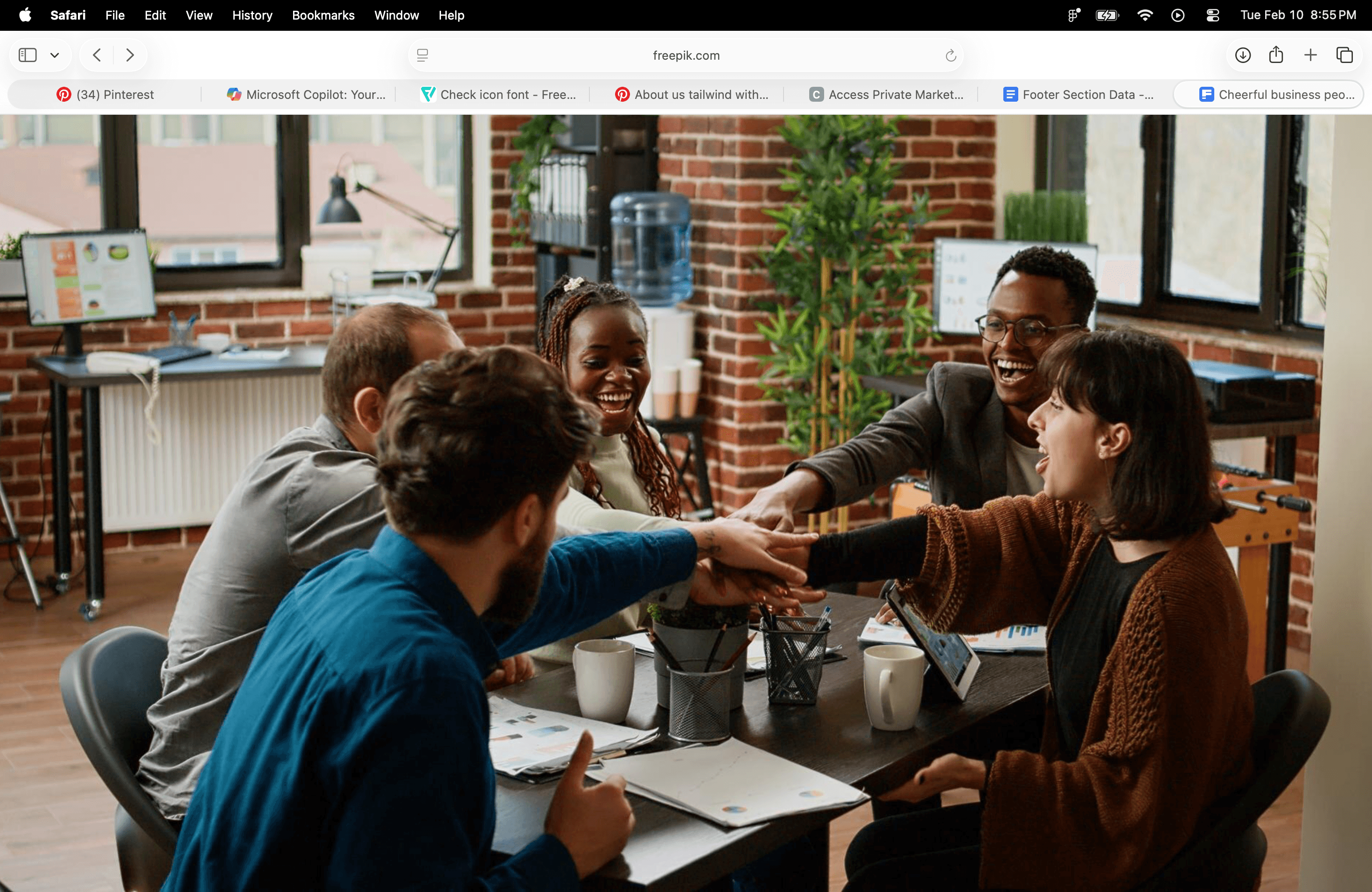 RC Brown Capital team collaborating around a table
