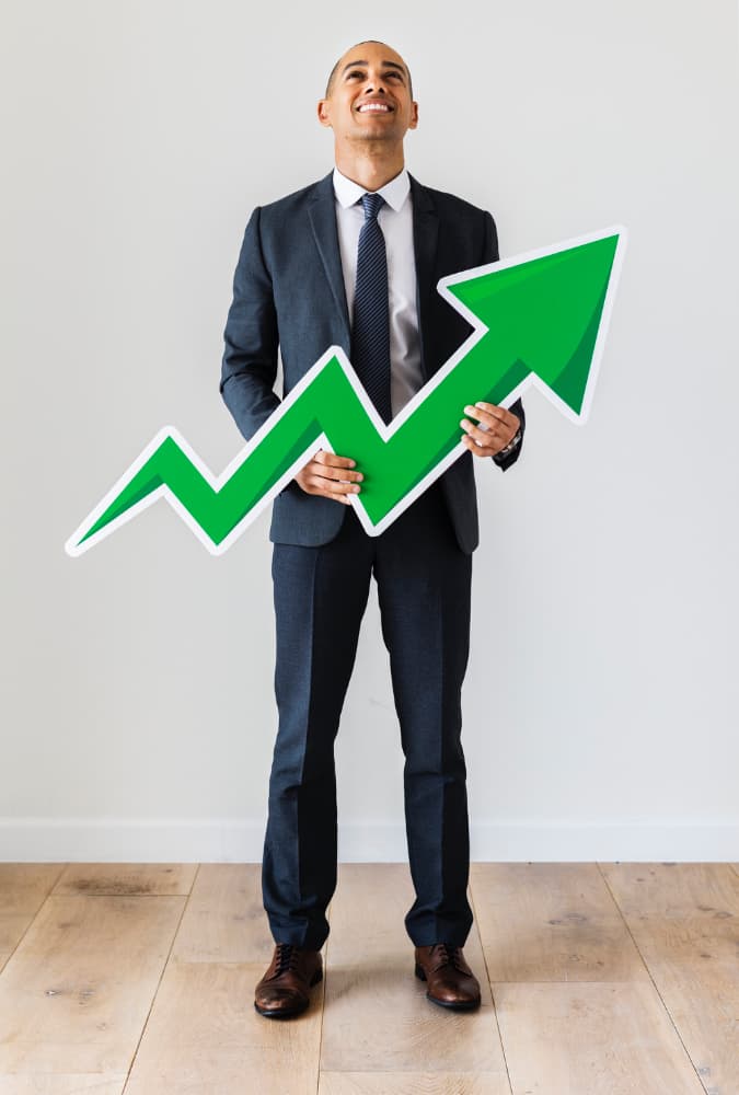 RC Brown Capital professional holding a growth arrow