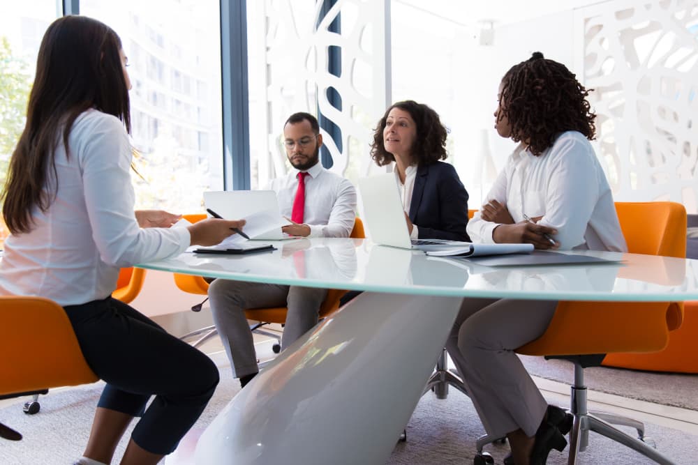 RC Brown Capital professionals collaborating in a meeting